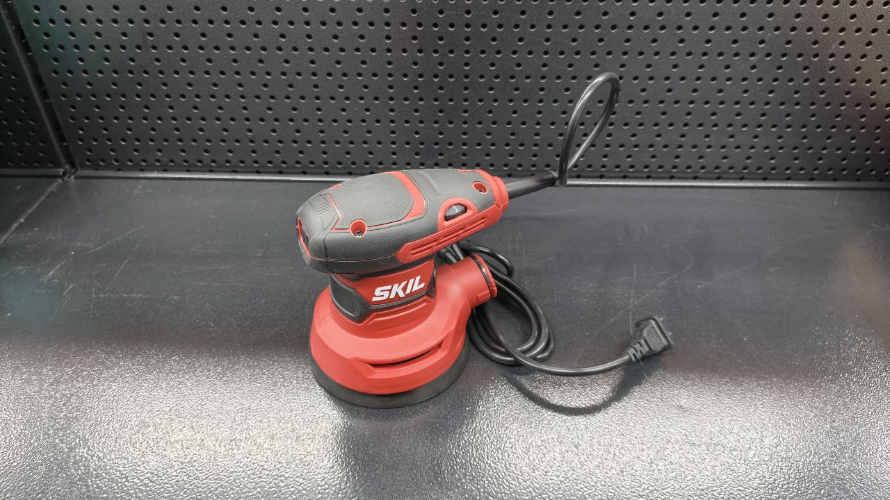 Эксцентриковая шлифовальная машина ."Skil-SR1E747101" 300Вт 125 мм